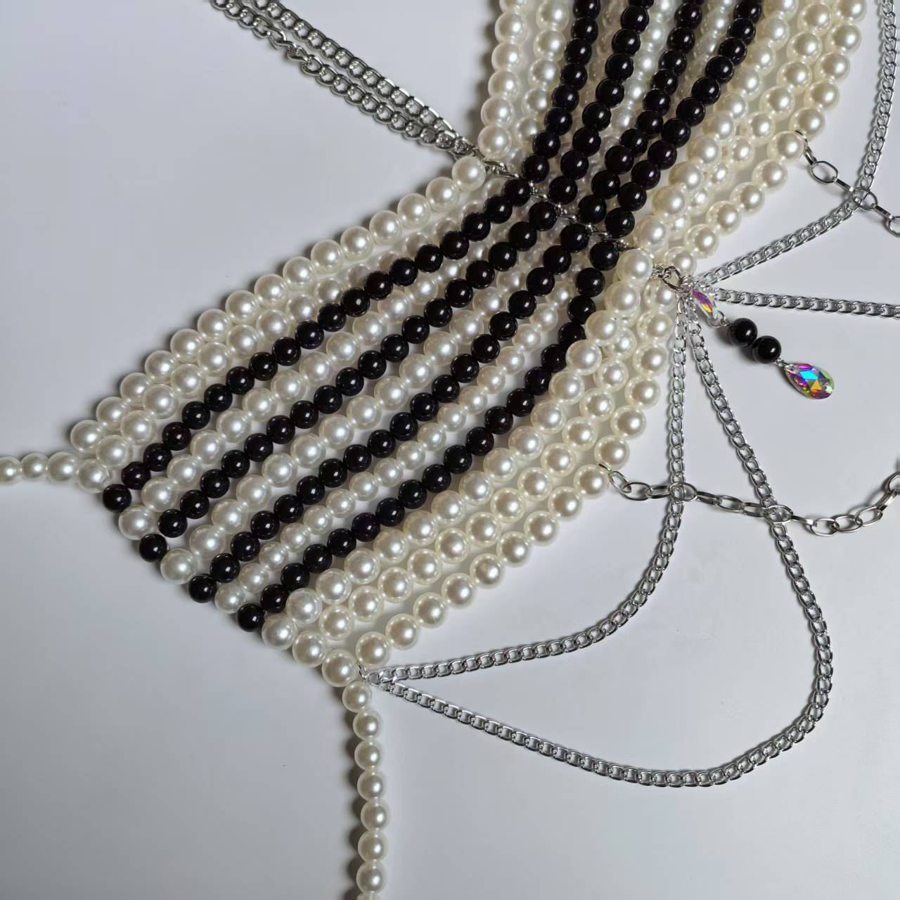 Black White Woven Plastic Pear - đánh giá và giá Body Jewelry Vest